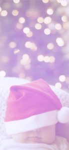 サンタクロースの帽子をかぶった赤ちゃん1